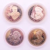 A boxed set of Isle of Man commemorative crown coins. The box 18.5 cm wide.