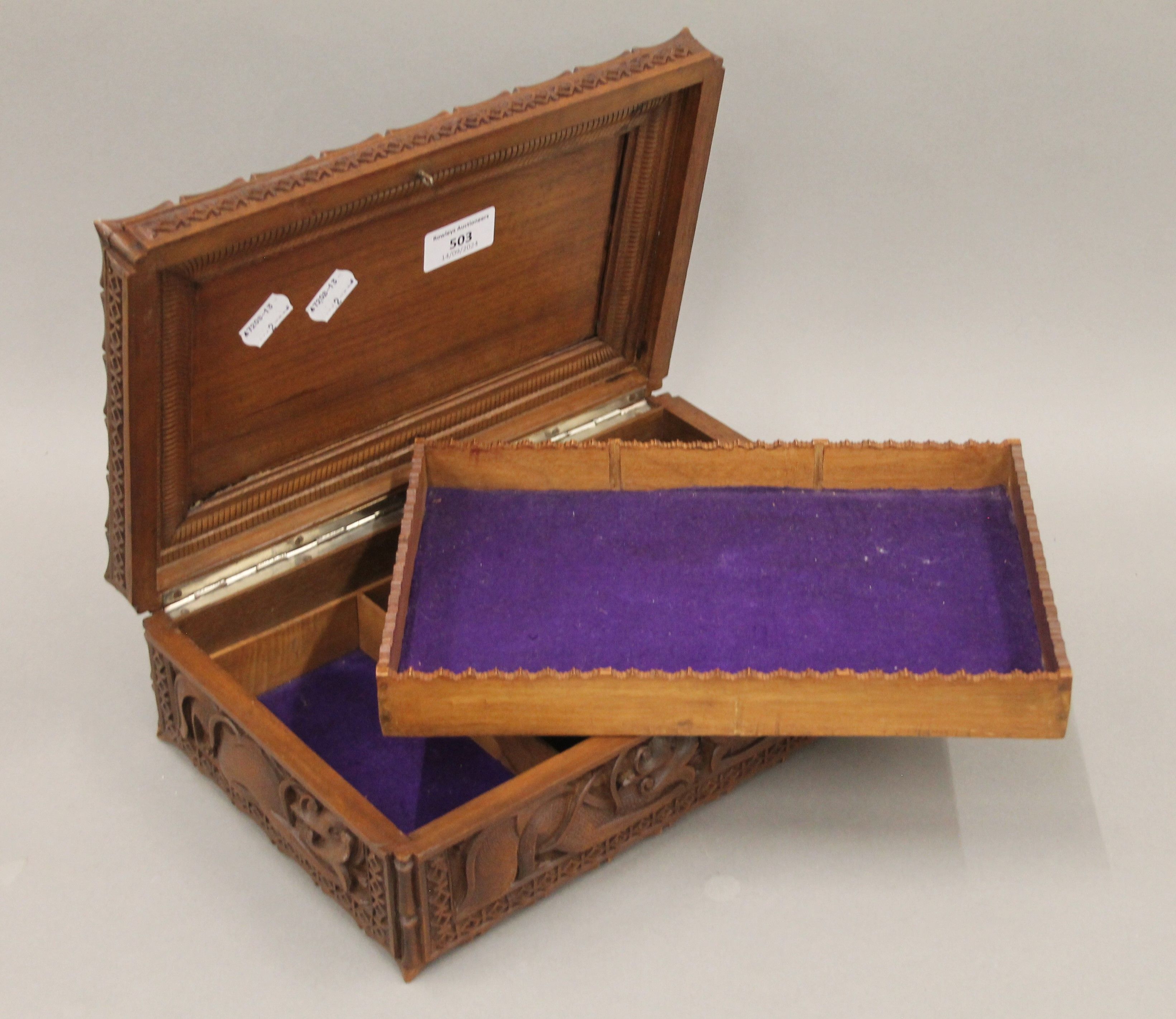 An Eastern carved hardwood box with all-over carved dragon decoration. 30 cm wide. - Image 4 of 6