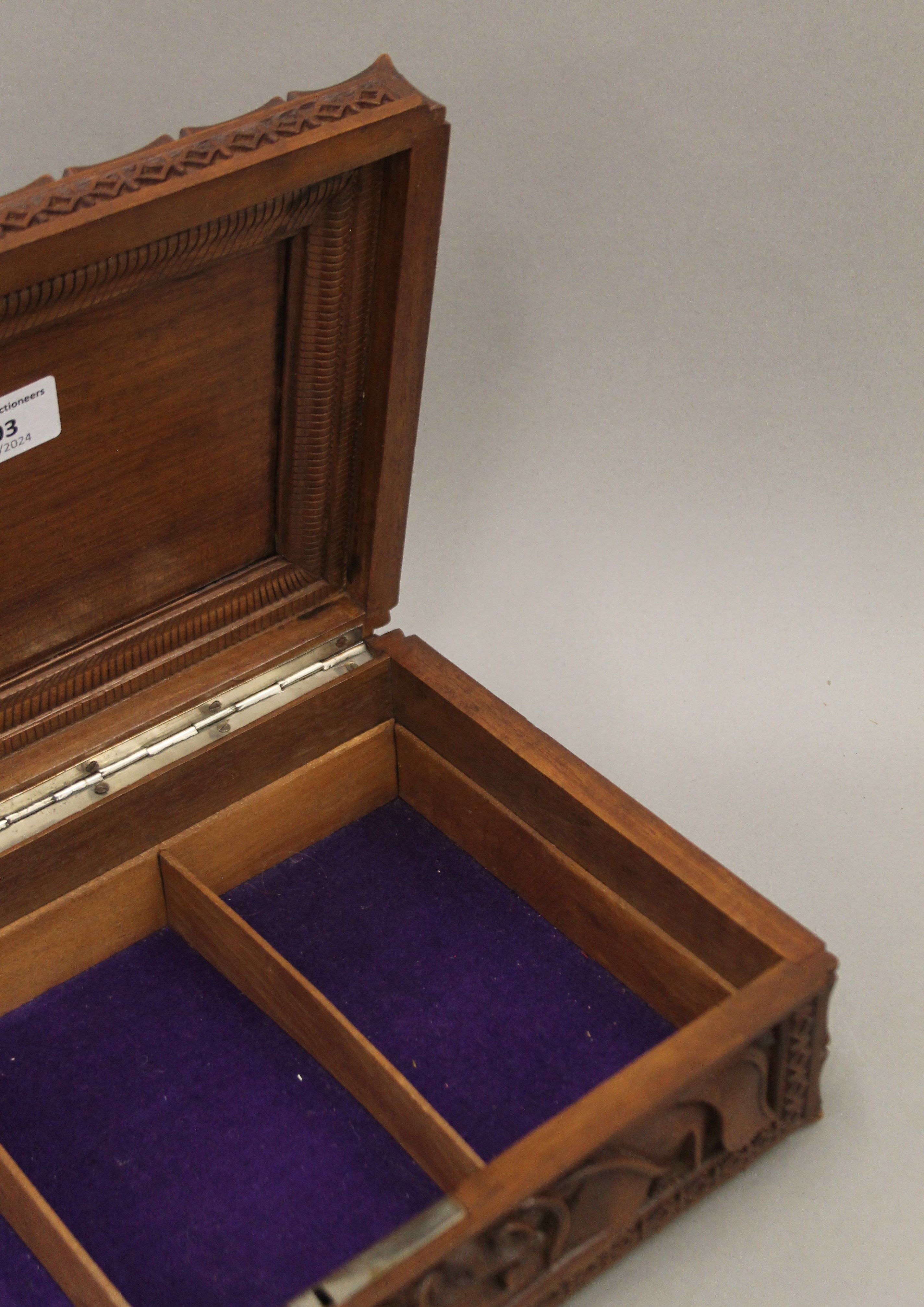An Eastern carved hardwood box with all-over carved dragon decoration. 30 cm wide. - Image 5 of 6