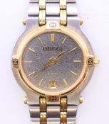 A Gucci two tone ladies wristwatch. 2.5 cm wide.