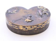 A small 19th century Japanese box. 5.25 cm wide.