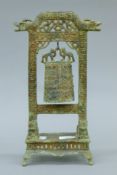 A Chinese archaic style bronze gong. 36 cm high.
