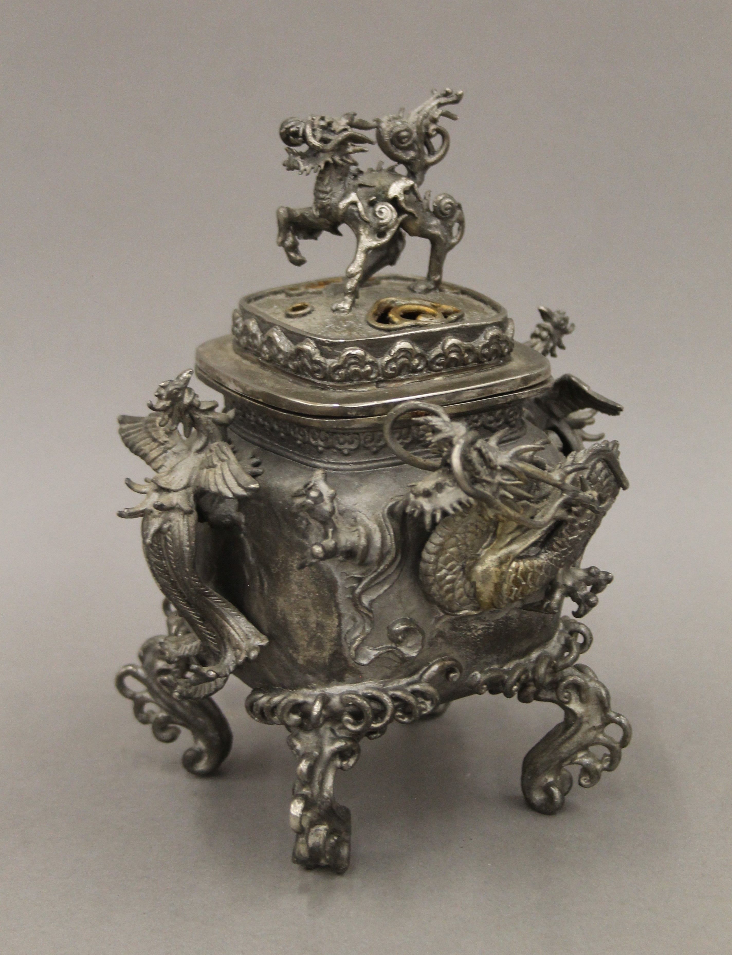 A 19th century Chinese silvered bronze censer, with some silver overpainting. 19 cm high.