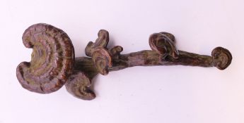 A bronze ruyi sceptre. 9.5 cm high.