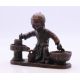 A bronze model of a boy cooking. 7 cm wide. - Image 2 of 4