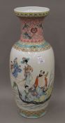 A large Chinese famille rose porcelain vase painted with figures and immortals in a boat,