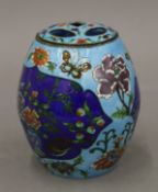A Chinese Republic period drum-shaped jar and lid, with all over blue ground enamelled decoration,