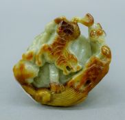 A Chinese carved jade snuff bottle. 6 cm high.