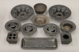 A quantity of Japanese metalware including incense burners. The largest 26 cm long.