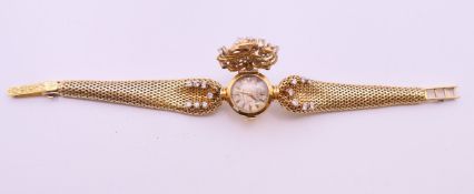 A ladies' diamond-set 18 ct gold Rolex bracelet watch with hidden dial,