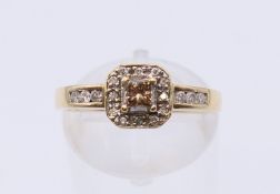 A 9 K gold diamond set ring. Ring size L.