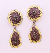 A pair of silver enamel earrings. Each 4.5 cm high.