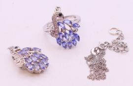 A tanzanite set pendant on chain and a ring. ring size N.