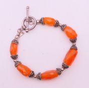 A silver stone set bracelet, 18 cm long.