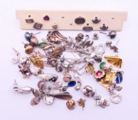 A collection of various silver and other earrings.