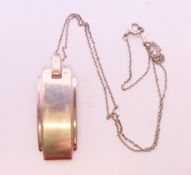 A Tiffany & Co Metropolis silver pendant and necklace inscribed 'I Love You'. The pendant 4 cm high.
