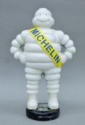 A cast iron Michelin man. 39 cm high.