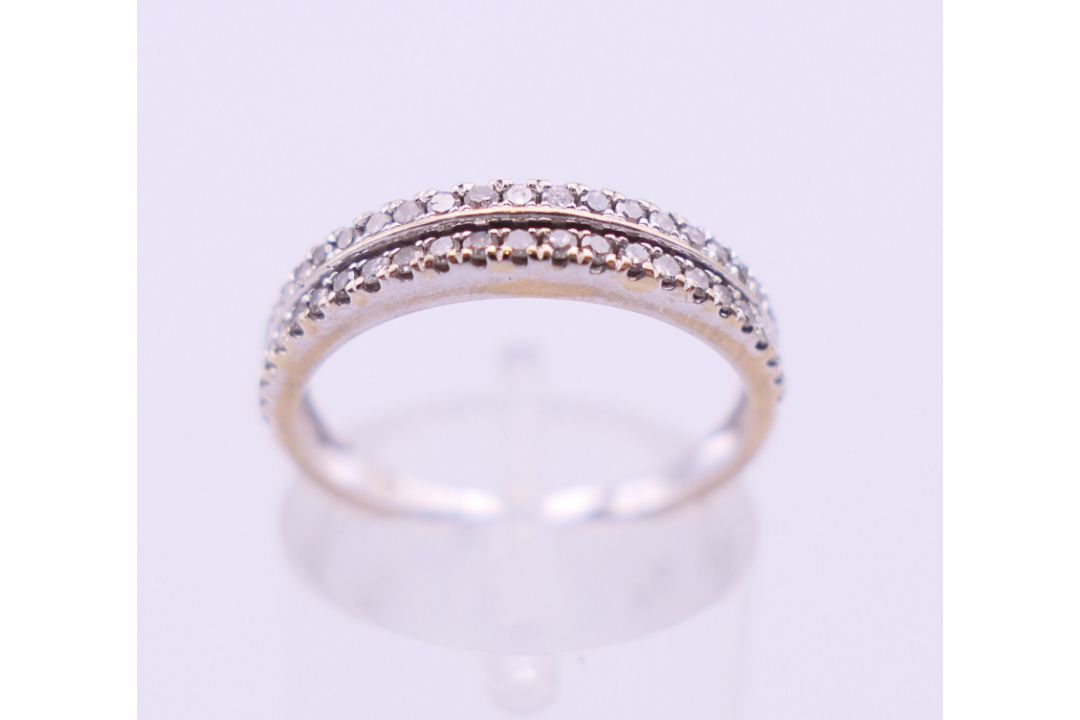 An 18 K white gold and diamond two-row ring. Ring size M. - Image 1 of 5