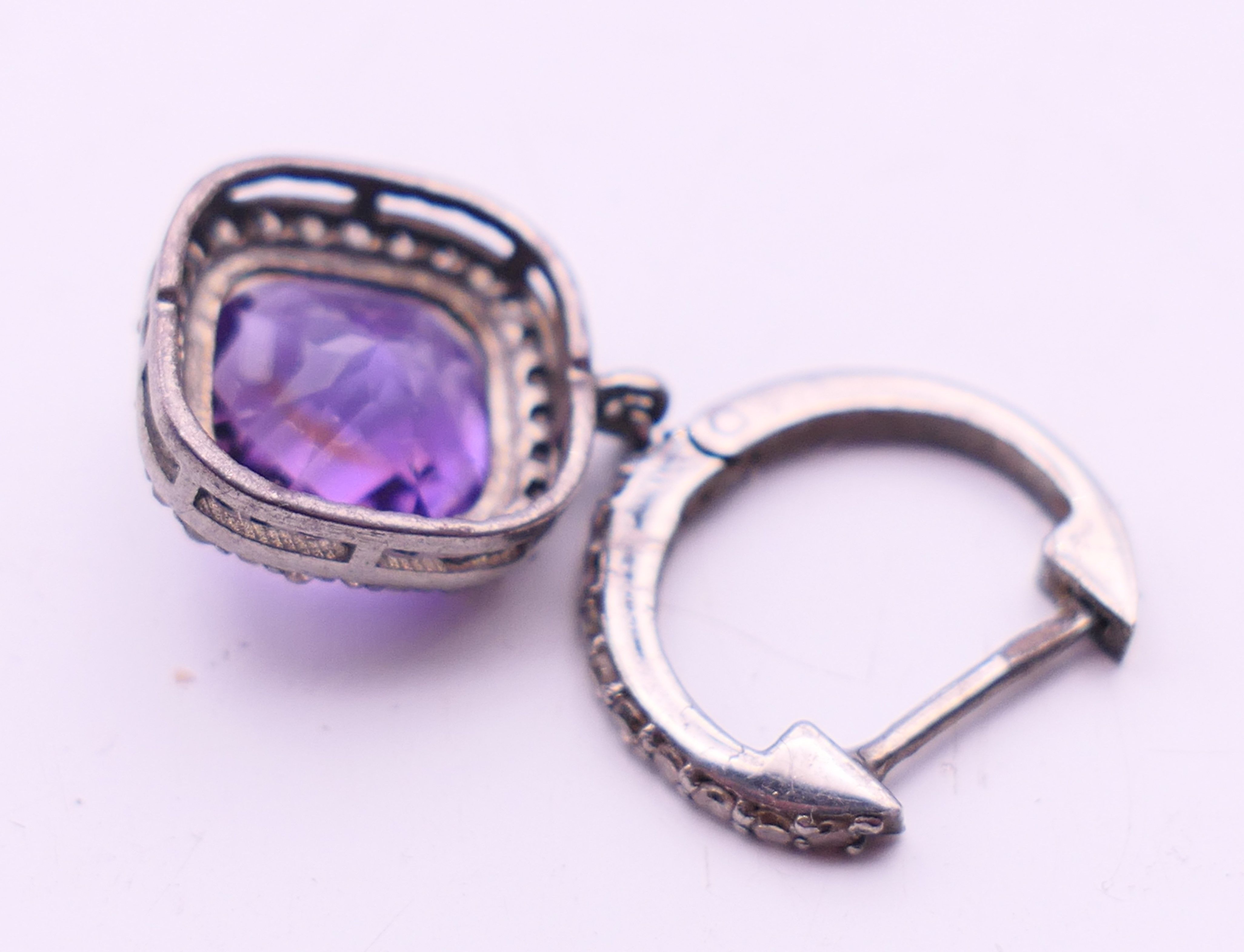A pair of diamond and amethyst earrings. The drops 1.2 cm high. - Image 4 of 4