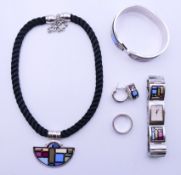 A suite of Michaela Frey (Freywille) enamel-decorated jewellery, comprising a bracelet,