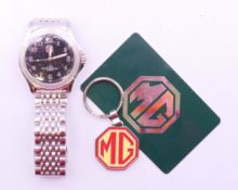 A boxed MG Owners' watch and a key fob, as new. The watch 4.25 cm wide.
