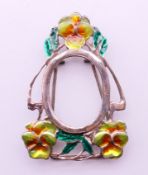 An Art Nouveau-style miniature photograph frame. 5 cm high.