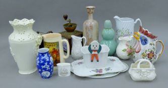 A quantity of various decorative porcelain etc including jugs, plates, coffee grinder, vases,