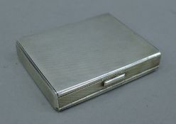 A silver double compartment snuff/pill box. 8 cm wide. 160.9 grammes.