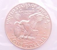 A 1974 Eisenhower uncirculated silver dollar.