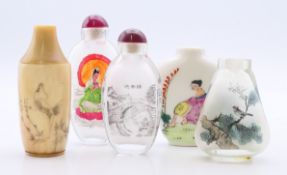Five Chinese snuff bottles. The largest 8.5 cm high.