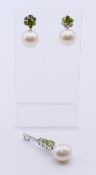 A cultured pearl, peridot and diamond pendant and matching earrings,