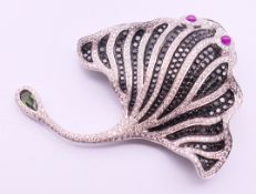 A ruby, diamond and gem-set stingray brooch, the pave-set black-gem stingray,