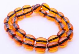 A bead necklace. 84 cm long.