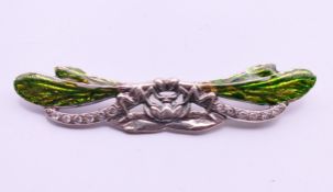 A silver double dragonfly brooch. 7 cm wide.