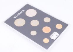 A collection of Bahrain 1965-1969 proof coins. 17 cm wide.