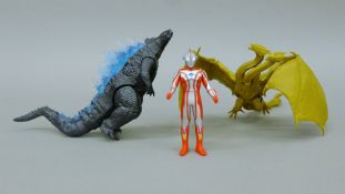A small quantity of Godzilla toys. Godzilla 16 cm high.
