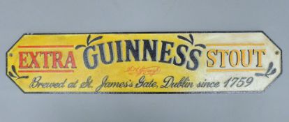 A cast iron Guinness sign. 56.5 cm long.
