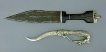 Two Eastern daggers. The largest 35 cm long.