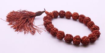 A nut form necklace. 30 cm long.