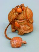 An inro formed as tortoises. 8 cm high.