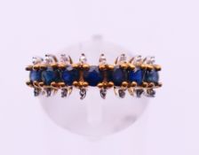 A 9 K gold sapphire ring. Ring size N.