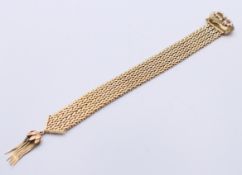 A 9 ct gold pearl set bracelet, 21.5 cm long, 56.1 grammes total weight.