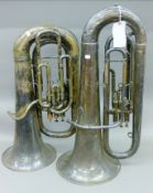 Two silver-plated tubas. The largest 85 cm high.