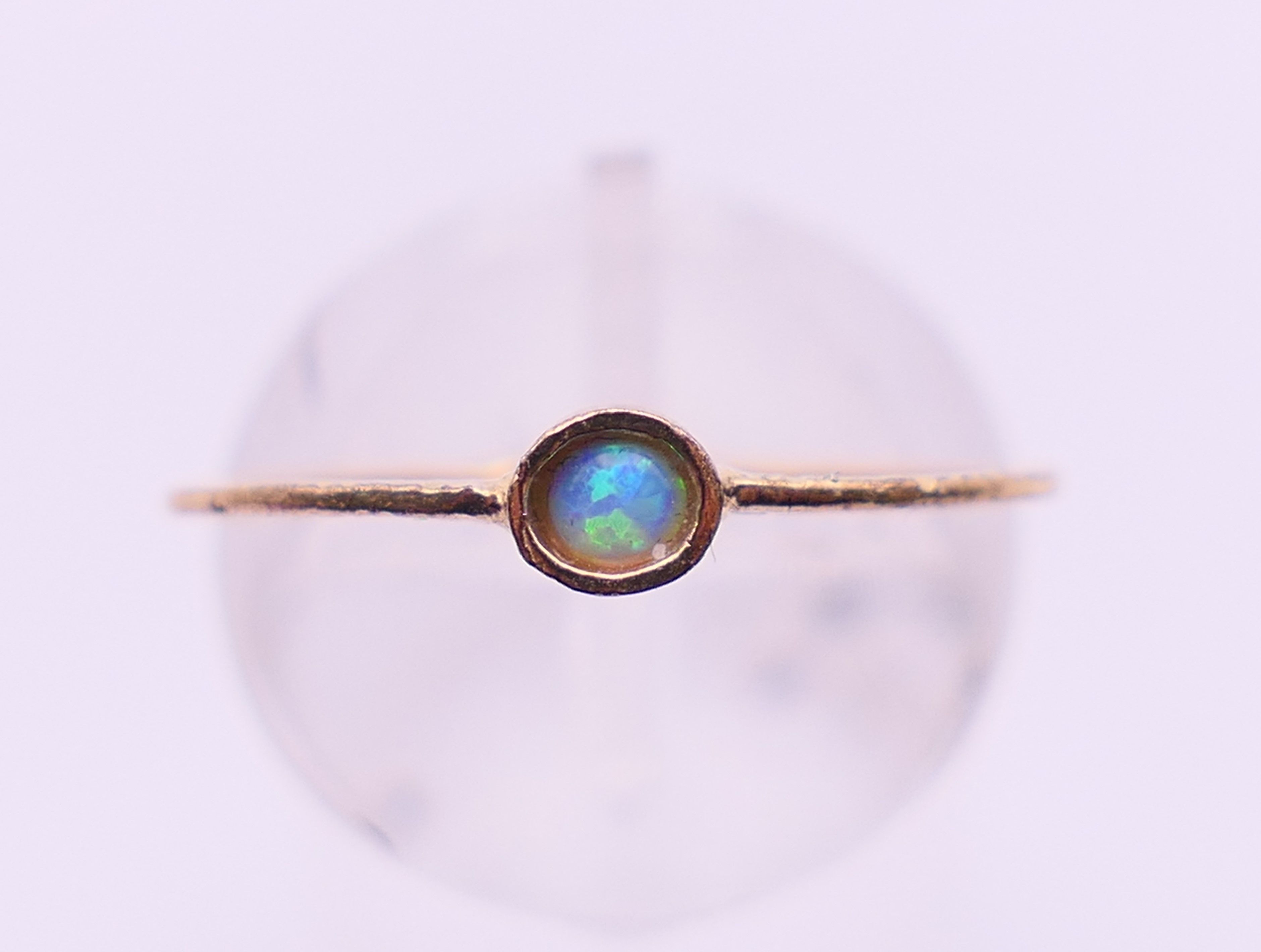 A 9 ct gold and opal ring. Ring size M/N.