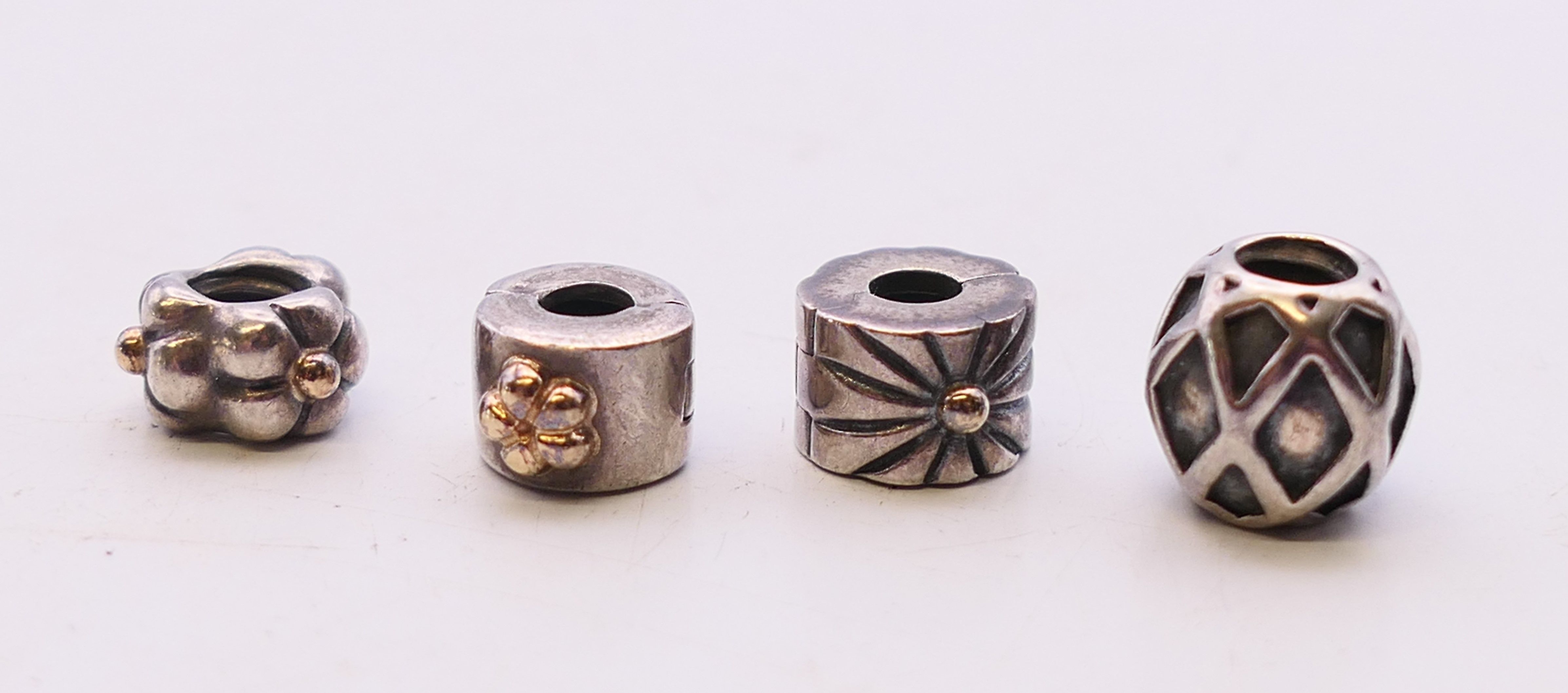 A boxed silver Pandora ring with four silver Pandora charms. Ring size L. - Image 7 of 16