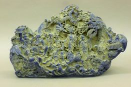A mould of a Chinese boulder carving. 38 cm long.