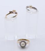 Two 9 ct gold pearl and diamond set rings, and an unmarked white gold pearl and diamond ring.