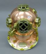 A copper model of a diver's helmet. 35 cm high.