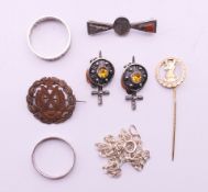Silver jewellery including a regimental brooch, a pair of earrings, two rings, a pin,