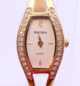 A ladies' Sekonda quartz wristwatch. 1.5 cm wide.